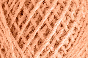 Skein of twine close-up. Color peach fuzz