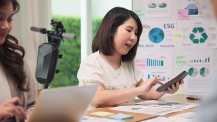 CO2 emission offset price advice control go green report. Net zero waste advisor ESG ethical asian team office meeting talking climate change. Group asia woman people SDGs plan expert social working.