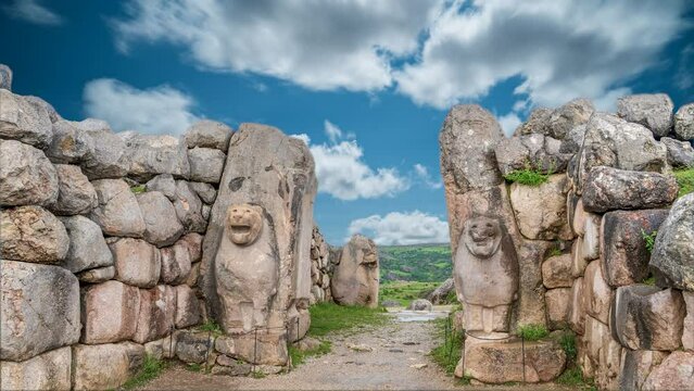 Time lapse shot of the gates of Hattusa, the capital of the Hittite Empire, with flowing clouds