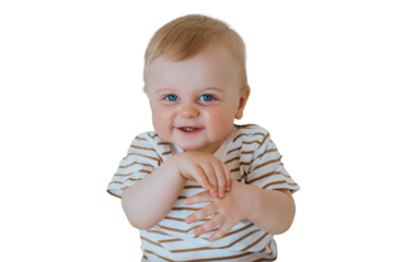 A little boy is sitting in a child's eating chair against transparent background, waiting, looking at the camera, and wants to eat. Healthy children, toddler at home in the kitchen. Childhood.