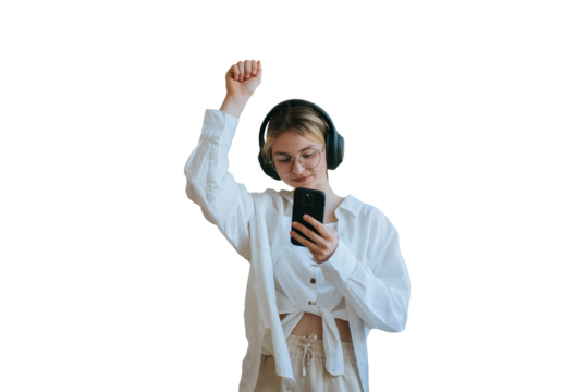 Teen girl in headphones listening music using phone dancing against transparent background. Youth, party time. Youngster enjoying sound quality with new earphones. Leisure. Relax. - Powered by Adobe