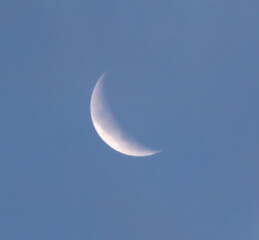 Obraz na płótnie Canvas Crescent moon on a blue sky