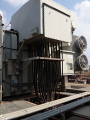 Large electrical transformers are used in factories