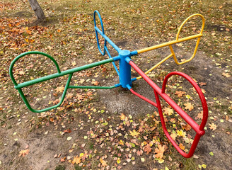 Swings on the playground in autumn