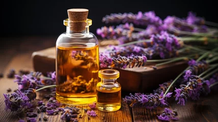 Keuken spatwand met foto Aromatic lavender oil in a bottle with lavender flowers © senadesign