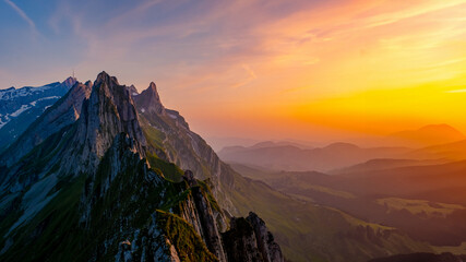 Schaeffler Mountain Ridge Swiss Alpstein, Appenzell Switzerland during sunset, a ridge of the...
