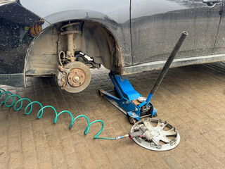 A brake disc on a removed car wheel
