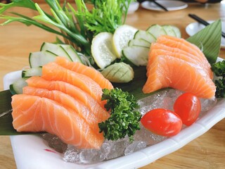 Salmon sashimi, a Japanese food, is popular all over the world.