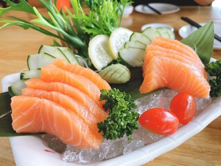 Salmon sashimi, a Japanese food, is popular all over the world.