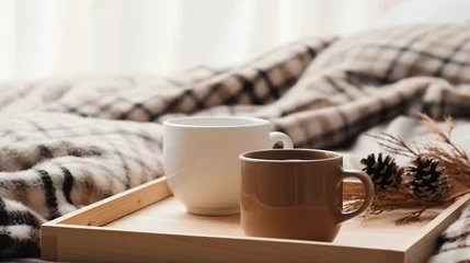 Foto op Plexiglas Wooden tray with coffee and warm plaid on white bed © Daniel