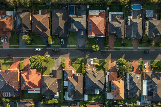 Aerial top down view of a quiet street lined with upmarket houses in outer suburban Sydney, Australia