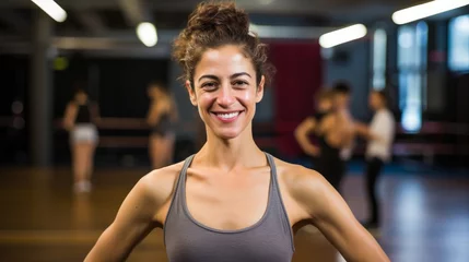 Cercles muraux École de danse Portrait of a passionate choreographer smiling, with a dance studio and dancers in the background