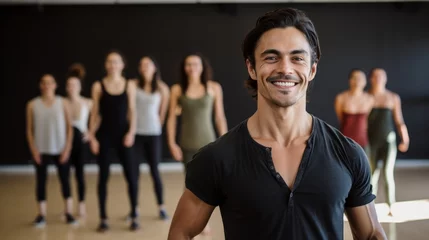 Photo sur Plexiglas École de danse Portrait of a passionate choreographer smiling, with a dance studio and dancers in the background