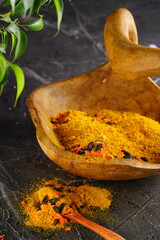Oriental spices on a wooden background. Indian seasonings
