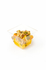 A small portion of vegetable salad on a white background