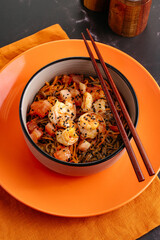 buckwheat Asian noodles with vegetables, sauce and shrimp