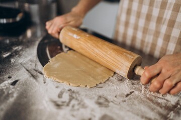 Woman baking Christmas and New Year cake