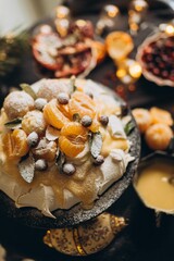 Woman baking Christmas Pavlova cake and New Year's honey cake