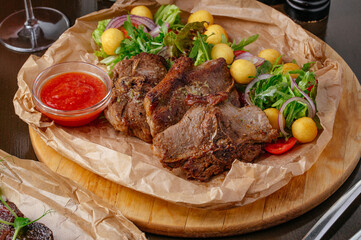 Baked beef with vegetables (carrots, peas, potatoes), horizontal
