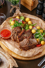 Baked beef with vegetables (carrots, peas, potatoes), horizontal