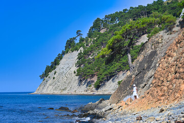 Tourist pilgrim on the Black Sea shore near Dzhanhot