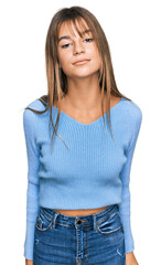 Fototapeta premium Teenager caucasian girl wearing casual clothes relaxed with serious expression on face. simple and natural looking at the camera.
