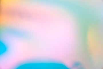 Abstract blur holographic rainbow foil iridescent background