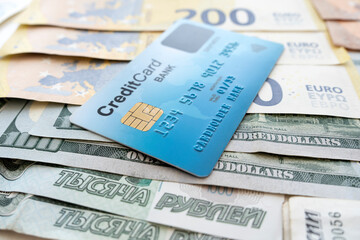 Top view money in various currencies. Dollars, euros, rubles. global economic crisis. Financial literacy. Currency basket. multi-currency card of payment system. exchange of money on stock exchange