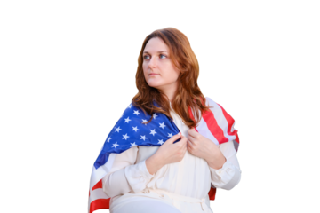 Happy woman wrapped up in the US flag in the autumn nature, isolated on a white background