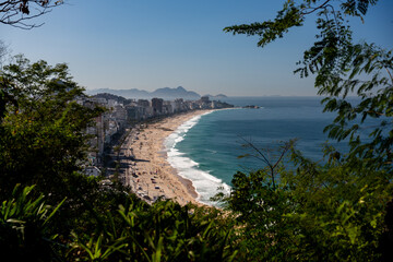 Fototapeta na wymiar Verdant Jungle Framing Leblon and Ipanema Beach in Brazil