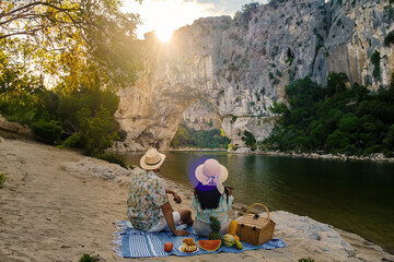 couple on vacation in the Ardeche France, view of Natural arch in Vallon Pont d'Arc in Ardeche...