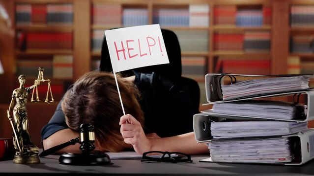 Young Stressed Female Lawyer Working
