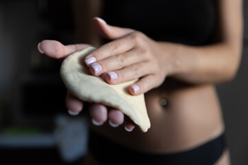  Girl rolling out dough in the kitchen