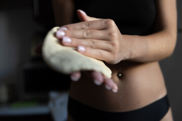  Girl rolling out dough in the kitchen