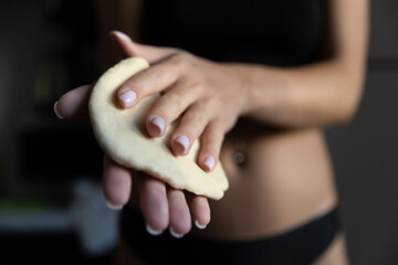  Girl rolling out dough in the kitchen