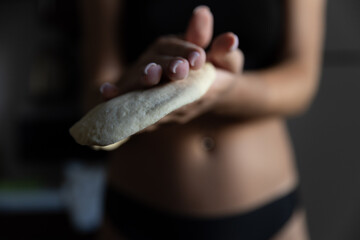  Girl rolling out dough in the kitchen