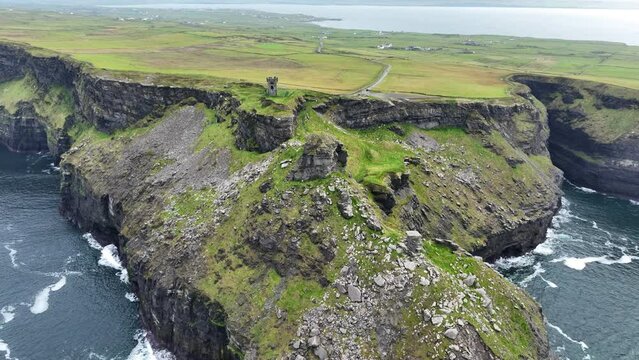 Drone Panning shot of The Cliffs of Moher wild Atlantic way on a November day wild Ireland in Winter