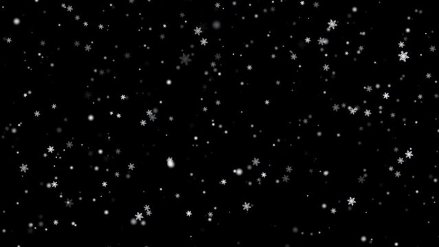 alpha Falling snowflakes and ice crystals in winter.
