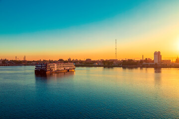 Obraz premium Cruise ships awaiting locking. Sunset on the Nile.