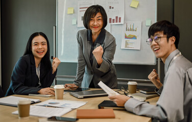 Professional business marketing team celebrating success goals, winning and achievement