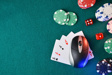 Online casino games with mouse on cards and objects around