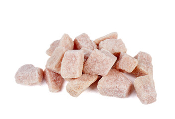 Big pieces of pink sugar isolated on a white background.