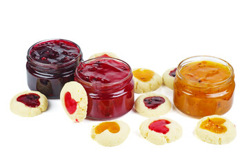 Three colored jam in glass jare with cookies shaped hearts
