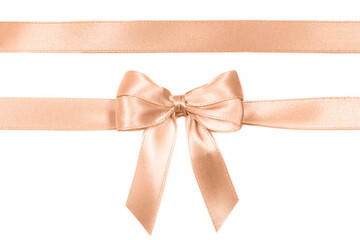 Peach ribbon with bow isolated on white background.