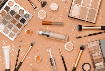 Flat lay of Makeup cosmetic product. New trending PANTONE Peach Fuzz colour of 2024 year