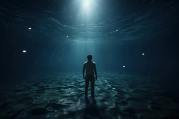 Fotobehang Man in moonlight at the bottom of sea © Luminophoria