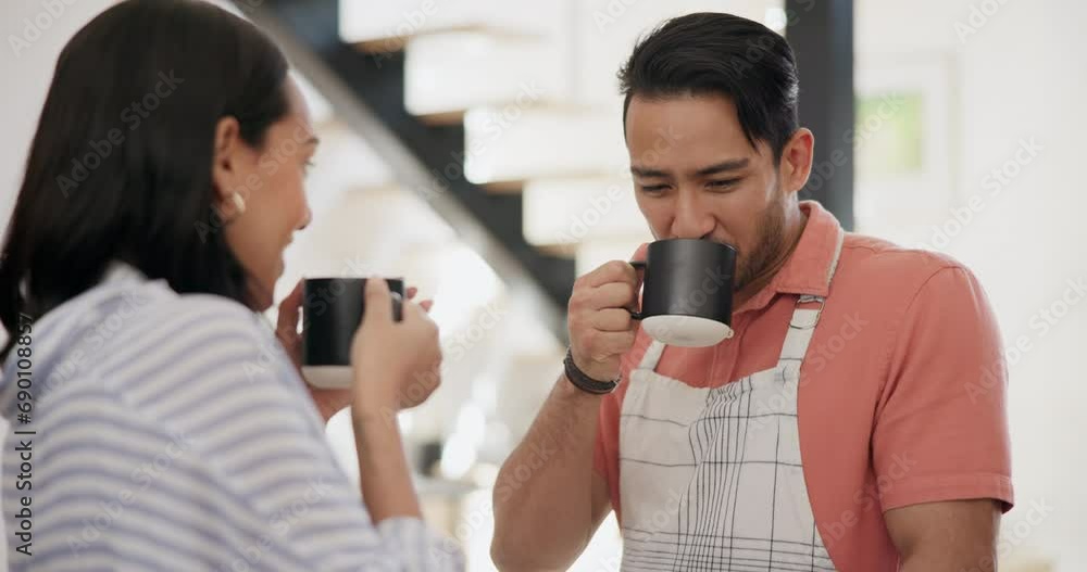 Wall mural Happy couple, laugh and conversation with drink, coffee and memory in morning, home and bonding. Asian man, woman and smile for chat, listen or comic joke with tea, coco or latte with laugh in house