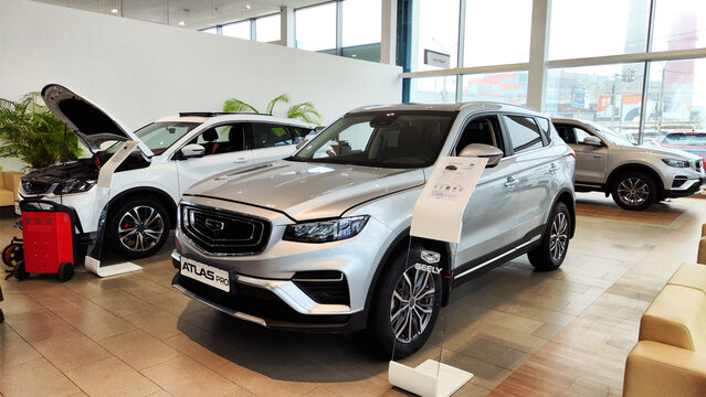 Cheboksary, Russia - March 20, 2023: Cars in showroom of dealership Chinese Car Manufacturer Geely