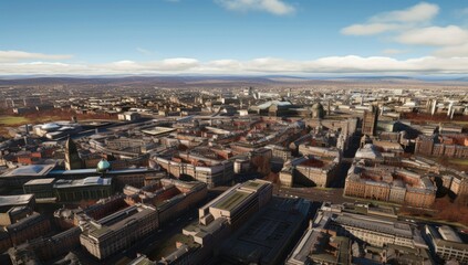 Fototapeta premium Aerial view of Glasgow's urban landscape showcasing historic architecture and contemporary buildings under a clear blue sky