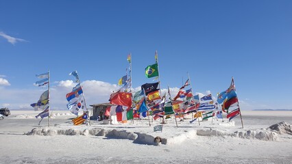 Salt flats Uyuni flags in front of salt hotel